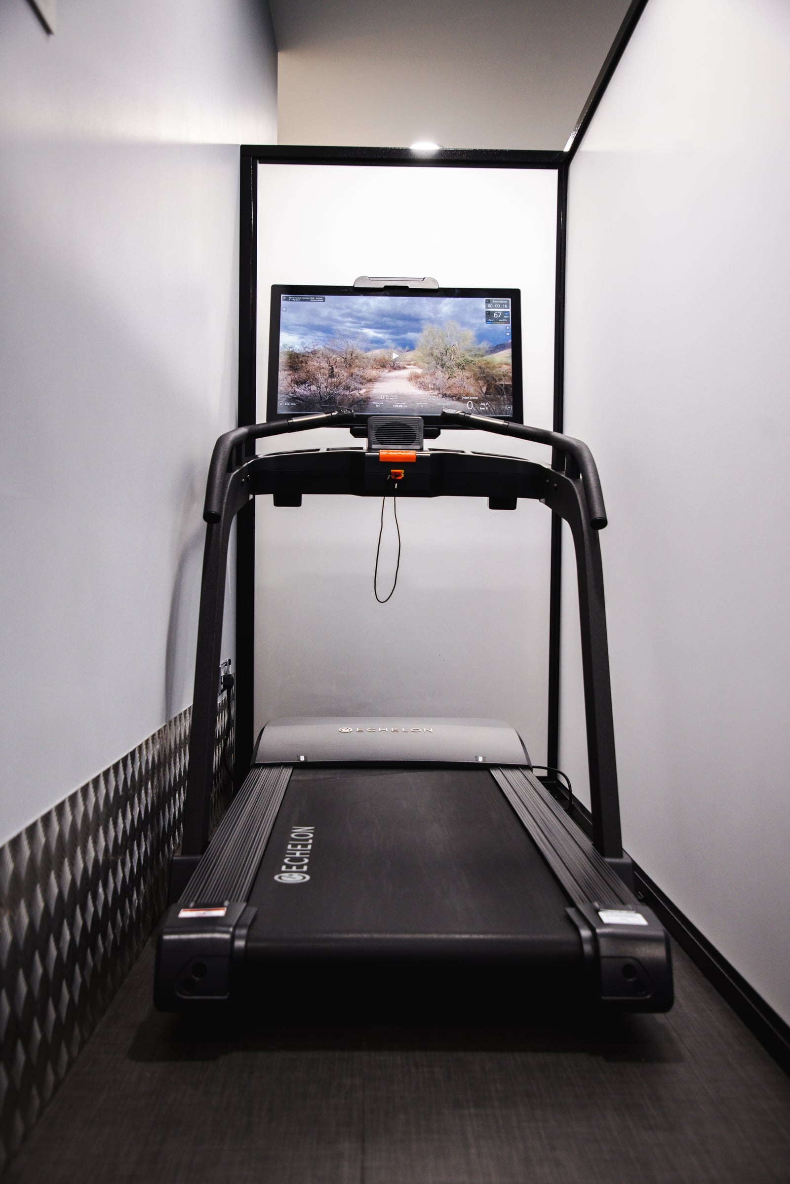 Echelon Stride S treadmill in a visually private cardio zone at GYMPODS Dalston