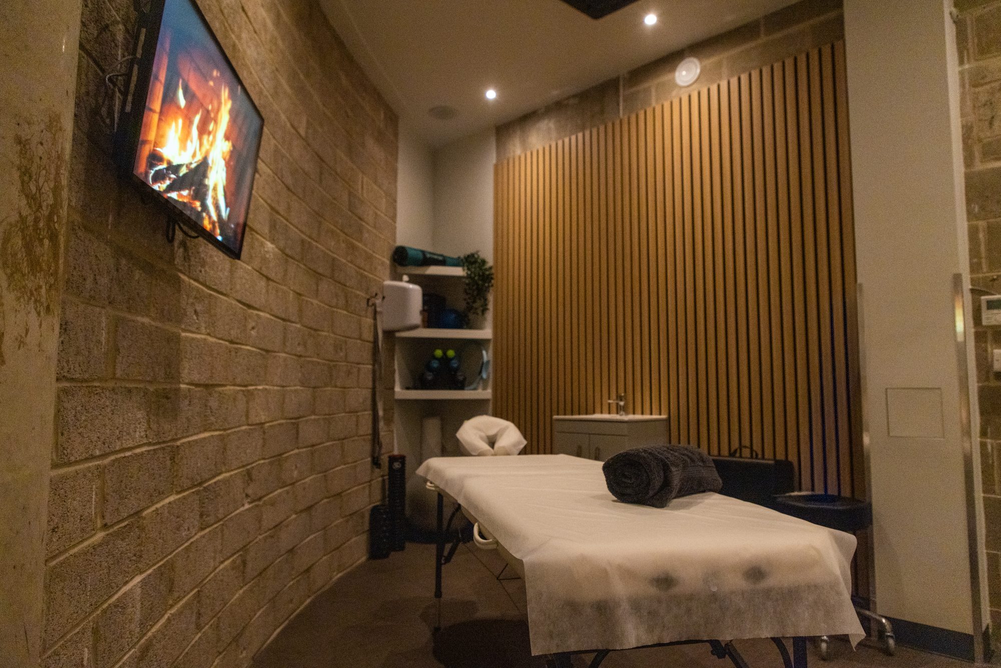 Inside a Holistic Treatment POD at GYMPODS Putney — a calm, private space designed for one-to-one client work