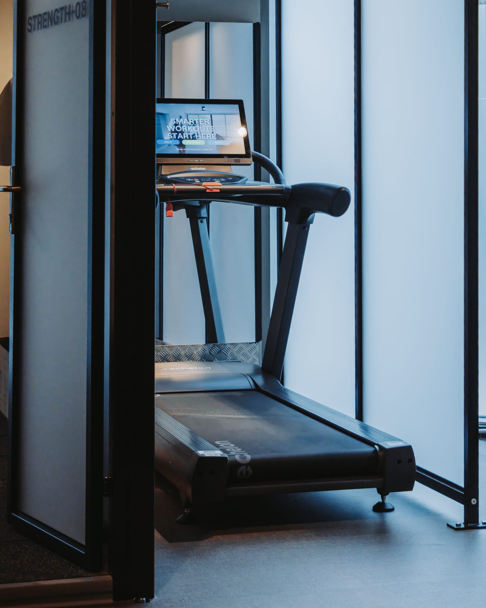 Echelon Stride treadmill in a visually private cardio bay at GYMPODS Putney