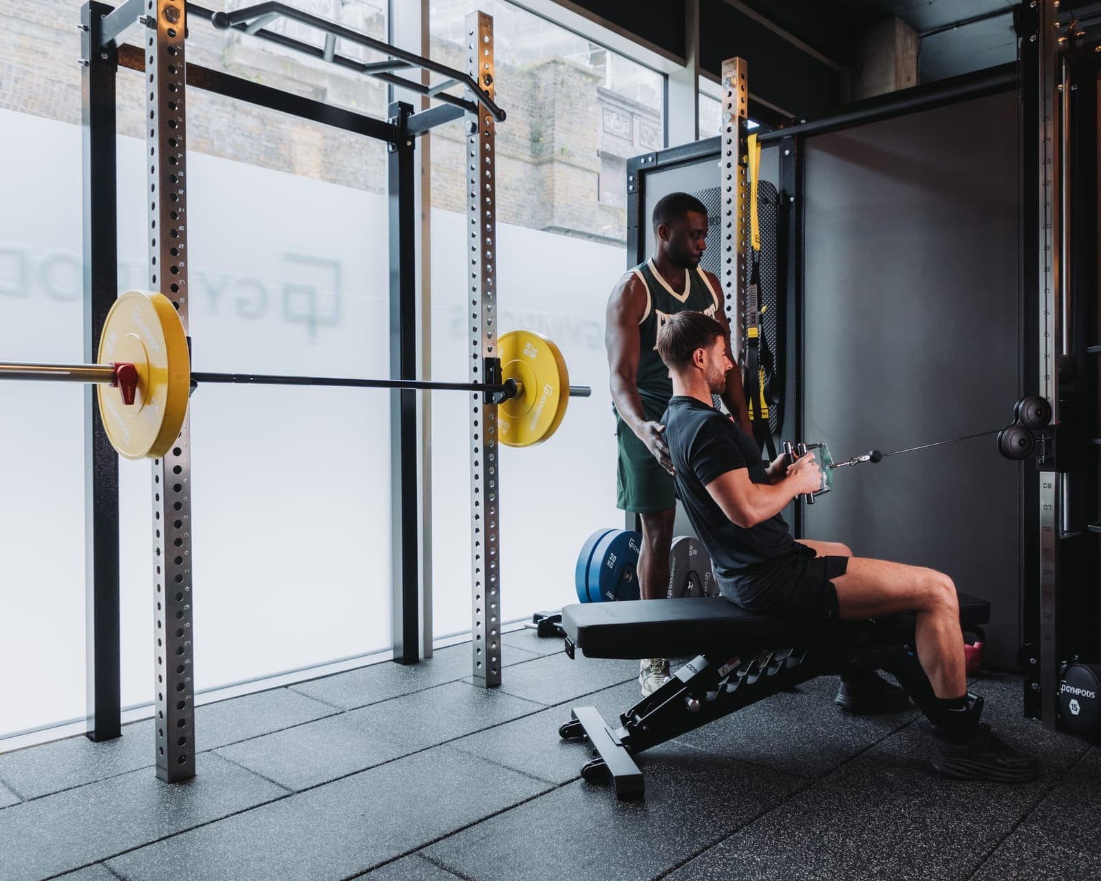 Strength POD at GYMPODS Putney with half rack and dumbbells